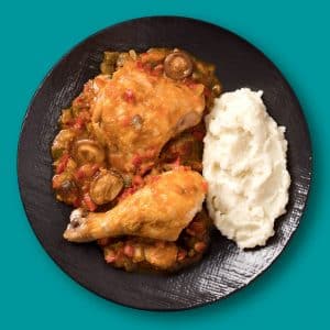 Pollo asado al chilindrón con puré de patatas casero (450 g.)