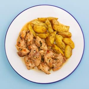 Pollo al ajillo con patatas gajo (400 g.)